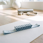 Blue numbered stretch strap with 12 loops on a mat